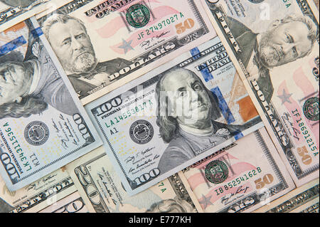 Background of  American currency in various denominations Stock Photo