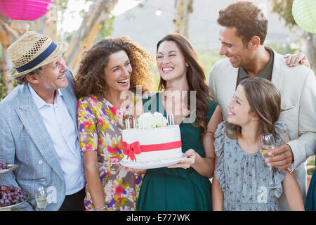 Family celebrating birthday together Stock Photo