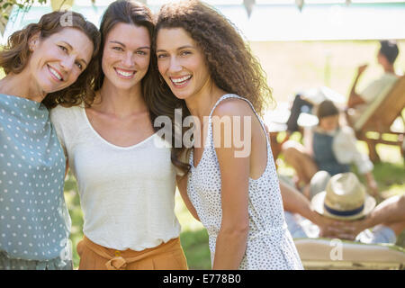 Family hugging at family picnic Stock Photo