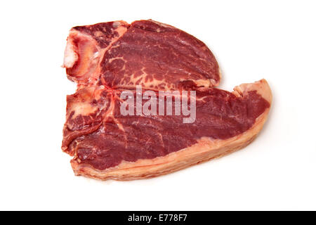 Uncooked T-bone beef steak isolated on a white studio background. Stock Photo