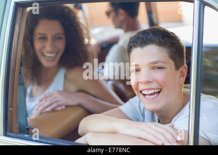 Family riding in car together Stock Photo