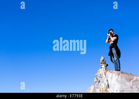 Man photographed at the camera Stock Photo