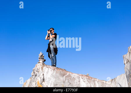 Man photographed at the camera Stock Photo