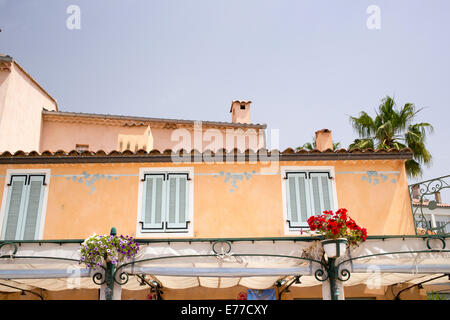 Pastel-colored house in port of Sanary, France Stock Photo