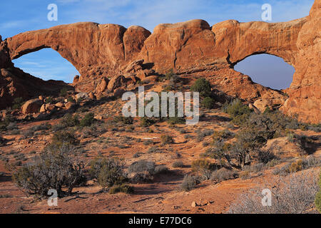 North and South Window Arch at sunrise in Arches National Park near Moab, Utah