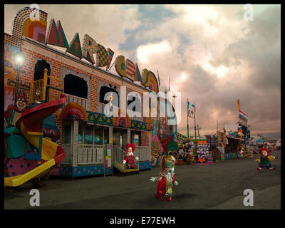 little clowns at a fair depiction Stock Photo