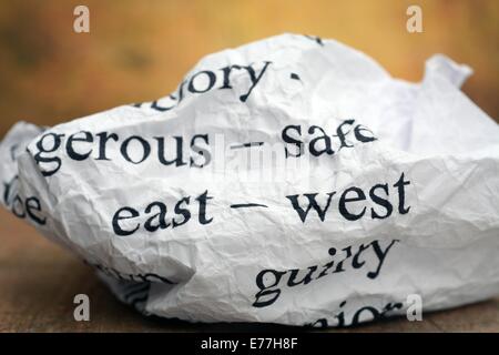 East - west text on paper Stock Photo