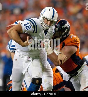 Denver, Colorado, USA. 7th Sep, 2014. Colts QB ANDREW LUCK readies to get sacked by the Broncos defense during the 4th. quarter at Sports Authority Field at Mile High Sunday night. The Broncos beat the Colts 31-24. © Hector Acevedo/ZUMA Wire/Alamy Live News Stock Photo