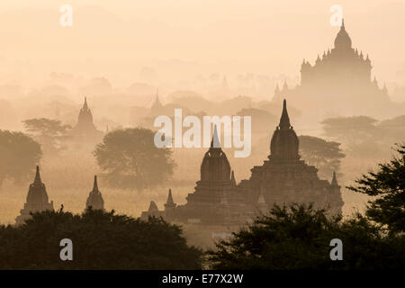 Temples in the morning mist, stupas and pagodas in the temple complex of the Plateau of Bagan, Mandalay Division Stock Photo