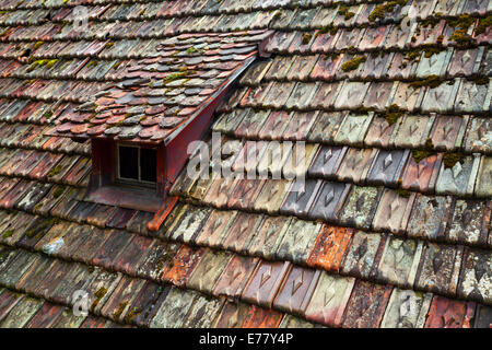 Old weathered roof with colorful tiles, Schaffhausen, Switzerland Stock Photo