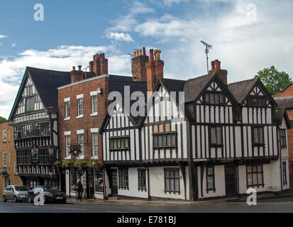 Iconic black & white 14th century heritage listed buildings, including tea room, Bear and Billet pub, and Ye Olde Edgar  in historic city of Chester Stock Photo