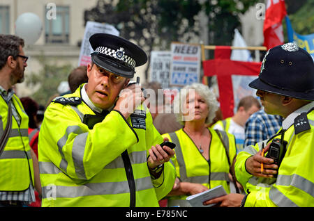 London, England, UK. Metropolitan Police officers at the People's march for the NHS, London, 2014 Stock Photo