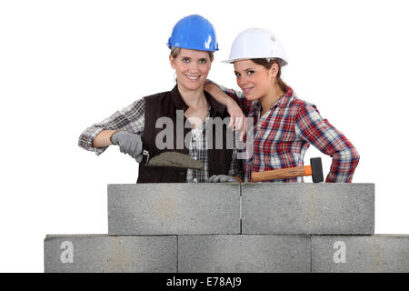 Female bricklayers Stock Photo