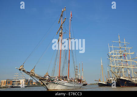 London, UK. 8th Sept, 2014.Royal Greenwich Tall Ships 2014- few of the Tall Ships moored at Woolwich Royal Arsenal Pier with  Dutch Tall Ship'Tolkien' about to take Day Trippers out along Woolwich Reach, River Thames Credit:  Wendy Johnson/Alamy Live News Stock Photo