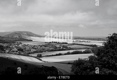 Black and white view from Lullington across the Downland and farmland and fields towards West Firle, Sussex Stock Photo