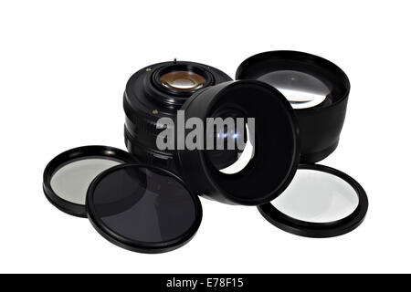 Photo lens and filters in pile isolated on white background Stock Photo