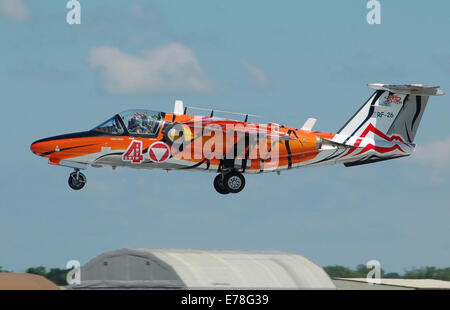 Saab 105 Oe military trainer (code RF-26) of the Austrian Air Force arrives for the 2014 Royal International Air Tattoo, Fairford, England. The colour scheme commemorates the 40th anniversary in 2010 of the first delivery of the Saab 105 to the Austrian A Stock Photo