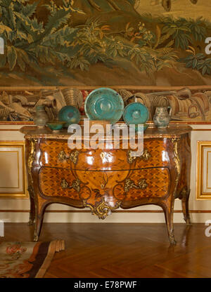 Elegant antique timber furniture with inlaid marquetry in intricate design in state room of Blenheim Palace, England Stock Photo