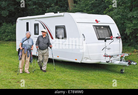 Senior couple and his caravan Stock Photo