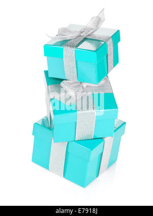 Three blue gift boxes with silver ribbon and bow. Isolated on white background Stock Photo