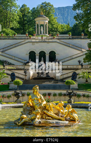 Flora Fountain surrounded by a water basin, the Venus Temple and terraced gardens at the back, castle grounds, Linderhof Palace Stock Photo