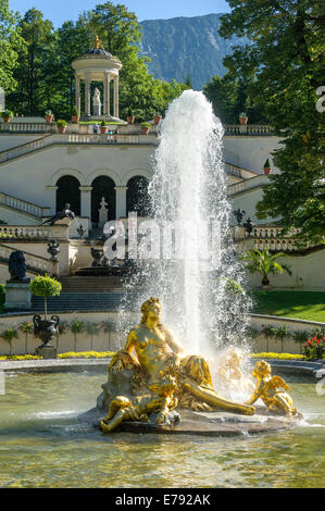 Flora Fountain surrounded by a water basin, the Venus Temple and terraced gardens at the back, castle grounds, Linderhof Palace Stock Photo