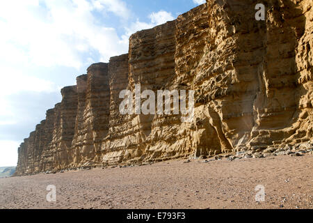 Sandstone cliffs and beach West Bay, Bridport, Dorset, England Stock Photo