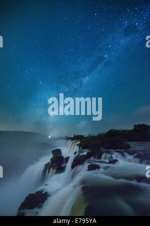 the Milky Way over Iguazu Falls at night, Argentina Stock Photo