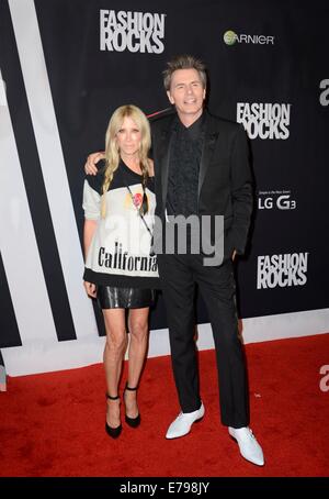 John Taylor & wife Gela Nash-Taylor arriving at the MAC Viva Glam V ...