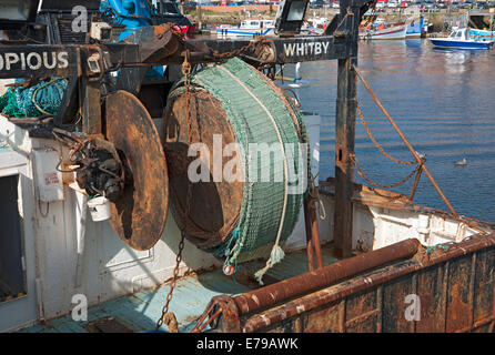 Close up of nets on fishing boat trawler winch at the quayside in summer Whitby Harbour North Yorkshire England UK United Kingdom GB Great Britain Stock Photo