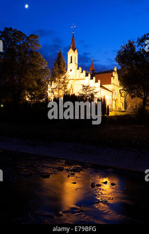 Church in Rymanow Zdroj, Poland. Evening time. Stock Photo