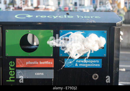 Rubbish litter recycling bins with polythene in wrong place being misused, UK Stock Photo
