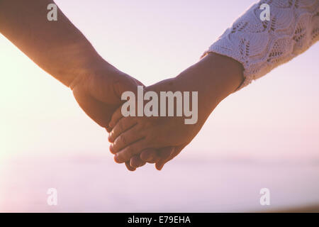 Senior couple holding hands Stock Photo