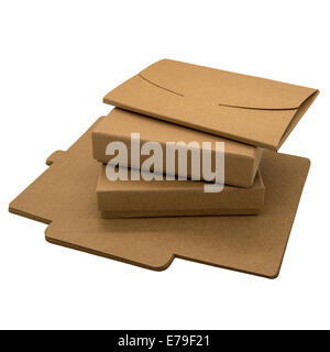 Foldable brown paper boxes and envelopes on a white background. Isolated Stock Photo