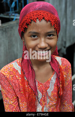 Smiling girl from the Cham muslim village, Chau Doc, Vietnam, Southeast Asia Stock Photo