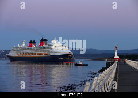 Cruise ship Disney Wonder arriving at port of Victoria at dawn-Victoria, British Columbia, Canada. Stock Photo