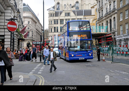 London, UK. 10th Sep, 2014. A broken down tourist bus brought central London to a standstill for several minutes by coming to a stop in a single lane section of Haymarket next to roadworks Stock Photo