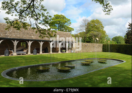 Italian style loggia garden with a pool and fountains at Whatley Manor in Wiltshire, England, UK Stock Photo