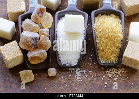 different types of sugar - brown, white and refined sugar Stock Photo