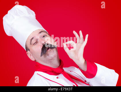 portrait of cook with gesture okay Stock Photo