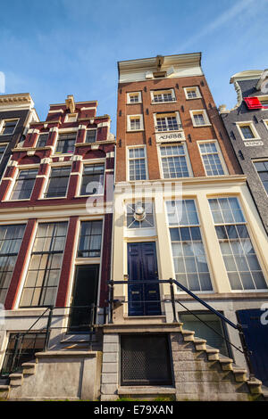 Facades of colorful living houses in Amsterdam, Netherlands Stock Photo