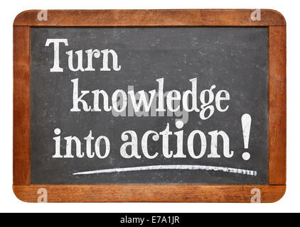 turn knowledge into action  - motivational advice on a vintage slate blackboard Stock Photo