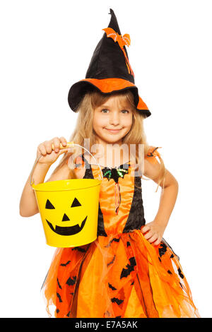 Little girl in Halloween witch dress Stock Photo