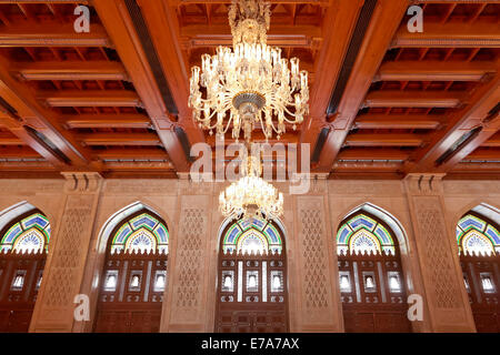 Prayer room for women with a wooden ceiling and a chandelier, Sultan Qaboos Grand Mosque, Muscat, Oman Stock Photo