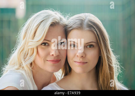 Portrait of beautiful friends spending leisure time outdoors Stock Photo