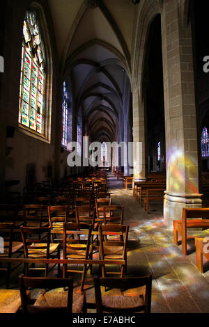 Side aisle of the nave of Fougeres Church - Eglise Saint Leonard. Brittany, France Stock Photo