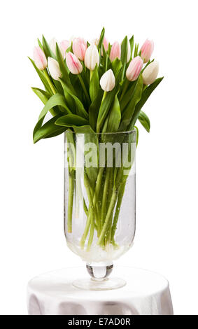 Pink and white tulips bouquet in vase isolated on white. With clipping path. Stock Photo