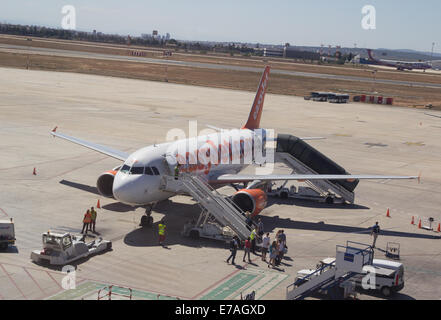 Valencia, Spain. 11th September, 2014. An EasyJet airliner at the Valencia Airport. EasyJet is a British airline carrier based at London Luton Airport.  It is the largest airline of the United Kingdom, by number of passengers carried, operating domestic and international scheduled services on over 600 routes in 32 countries. Stock Photo