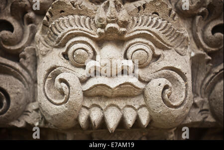Face of the ancient deities carved in stone. Indonesia, Bali island Stock Photo