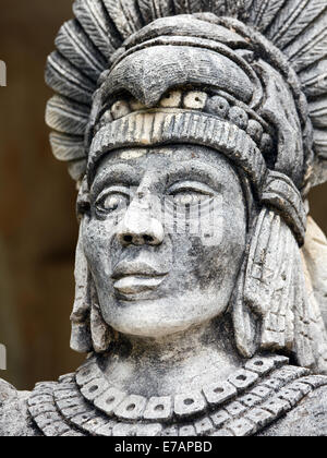 Portrait of stone Mayan warrior on Yucatan Peninsula, Mexico Stock Photo